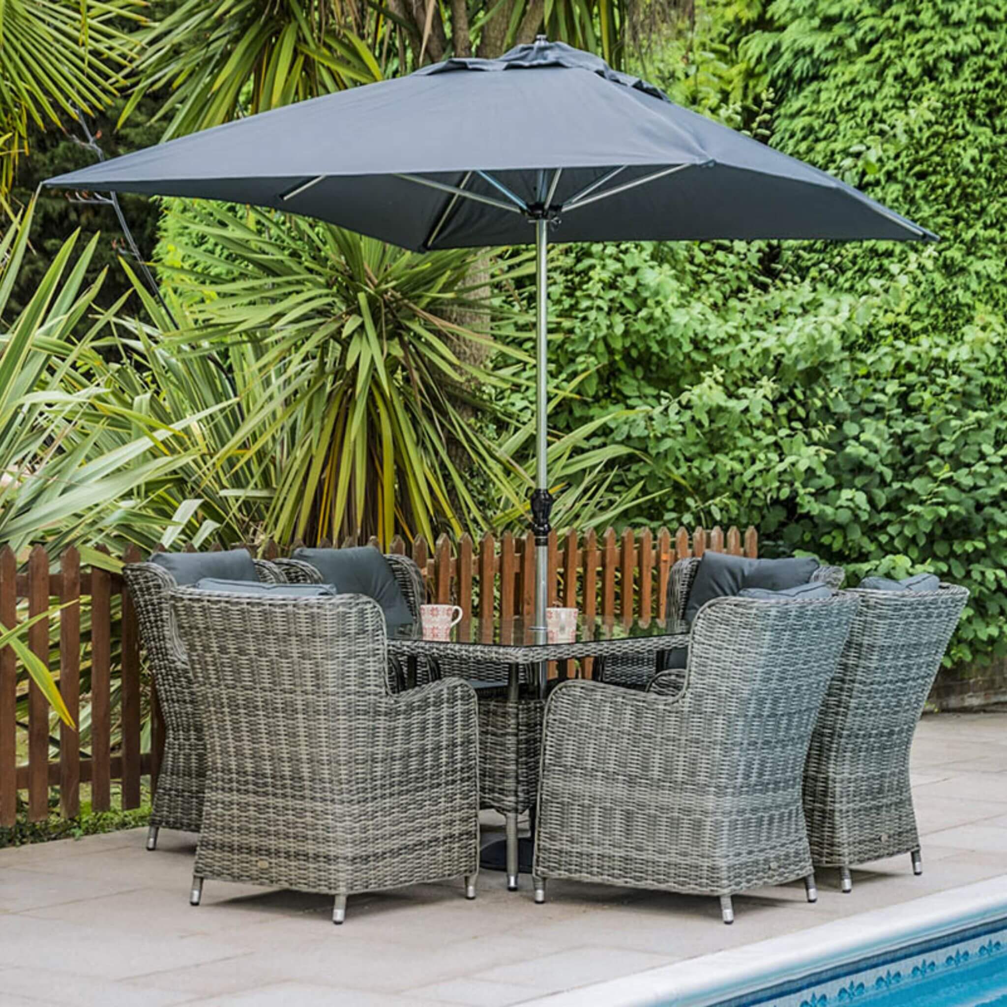 Katie Blake Seville 6 Seat Rattan Armchair Garden Dining Chairs, Parasol & Rectangular Table Set