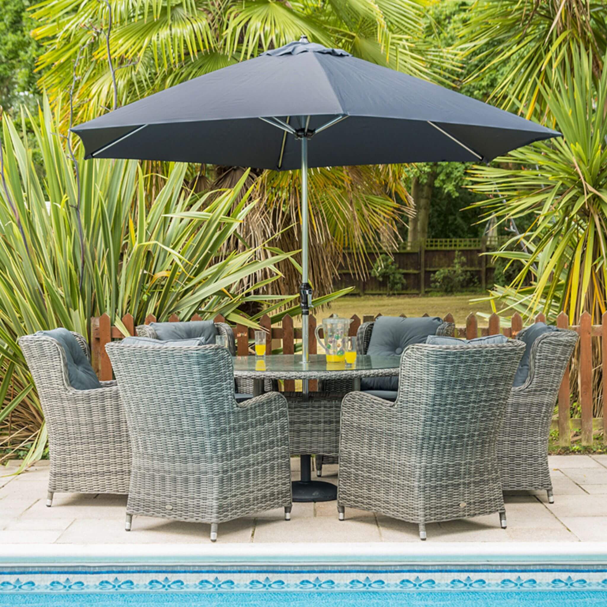 Katie Blake Seville 6 Seat Rattan Armchair Garden Dining, Parasol & Round Table Set