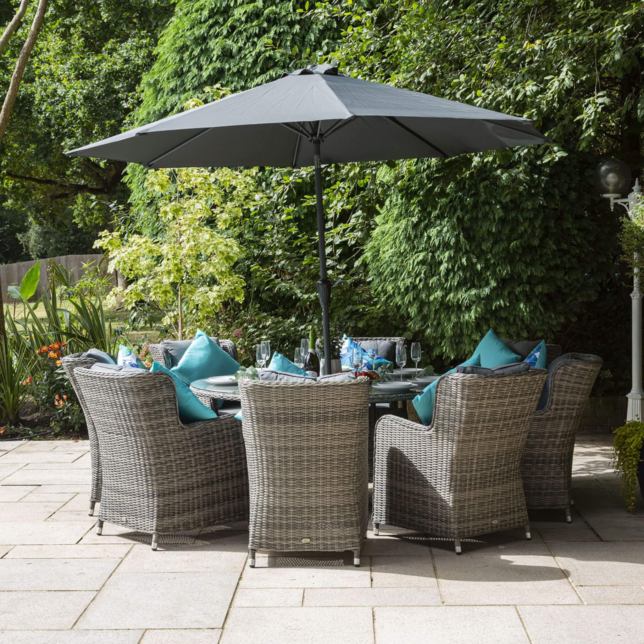 Katie Blake Seville 8 Seat Rattan Armchair Garden Dining, Parasol & Round Table Set